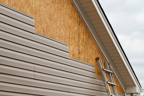 Professional Fiber Cement Siding technician working in Breezewood, PA